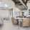 a clubhouse with seating and tables